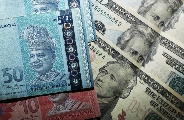 FOREX: Ringgit Opens Marginally Lower Against US Dollar