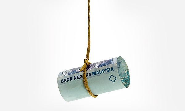 Ringgit slips against greenback